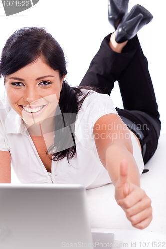 Image of Happy bsuiness woman showing thumbs up