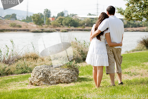 Image of Rear view full section of couple holding eachother