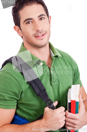 Image of Young student carrying bag and books