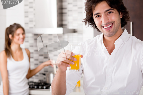 Image of youn couple cheersing