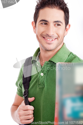 Image of handsome young student smiling with the books