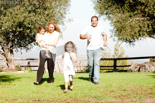 Image of Parents playing with kids
