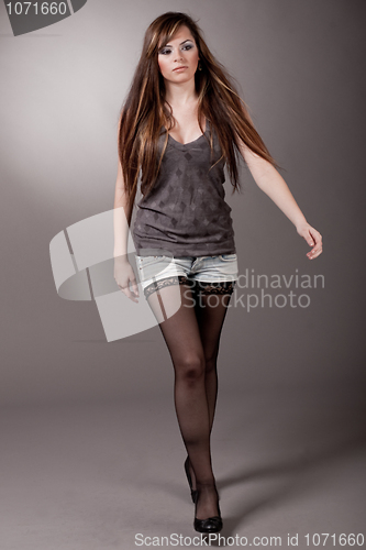 Image of Cute young model walking