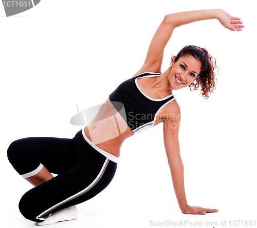 Image of Fitness woman stretching her hand