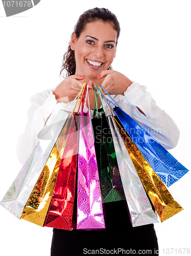 Image of Close up of Happy Young woman with shopping bag