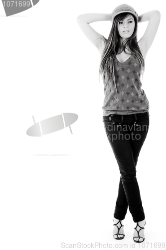 Image of Standing pose of a model with hands folded up