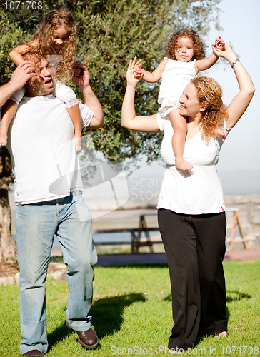 Image of Parents with their daughters