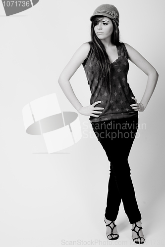 Image of Full length black and white image of a brunette model