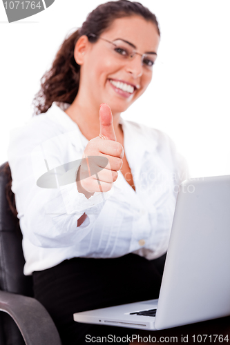 Image of young business Woman showing thumbs up sign