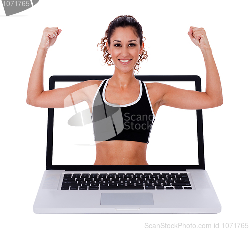 Image of Fitness woman showing a exercises  position through laptop screen