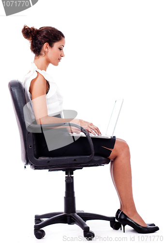 Image of Portrait of a woman working with laptop