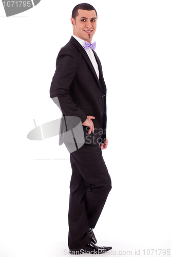 Image of Young stylish business man standing