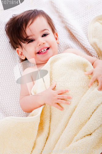 Image of Baby lying down after bath