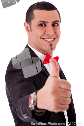 Image of Business man showing his success with thumbs up