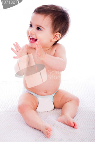 Image of Cute baby sitting and enjoying