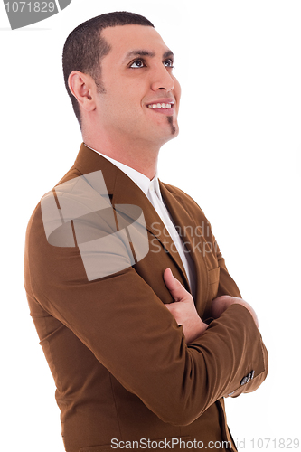 Image of Business man thinking by looking up