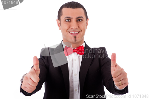 Image of Half length of successful business man with thumbs up