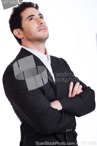 Image of Handsome young man looking up