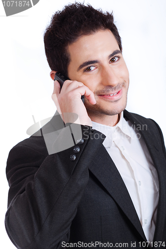 Image of Handsome Young business man on a phone call