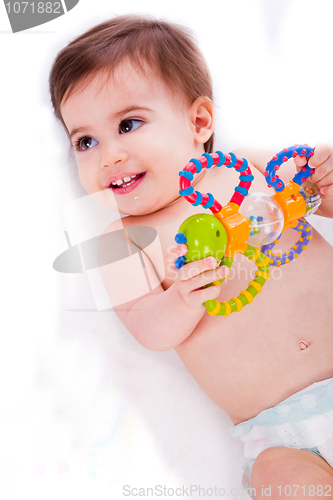 Image of Baby playing with toys