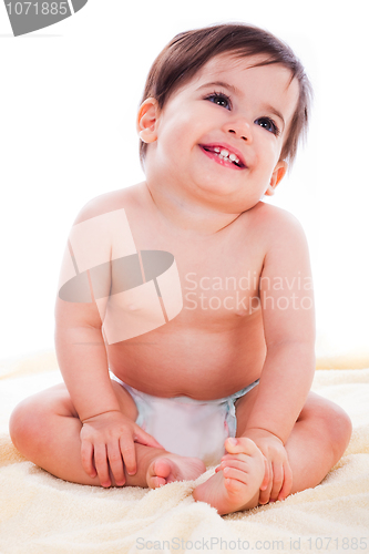 Image of Baby sitting and smiling