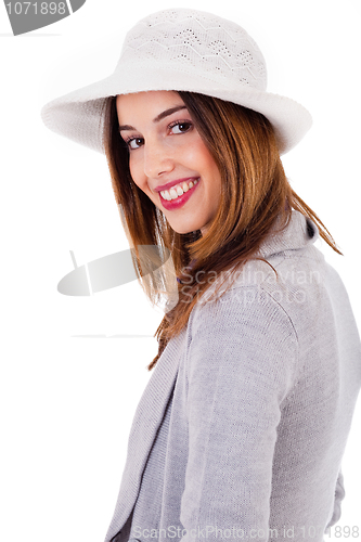 Image of Side pose of a young model smiling