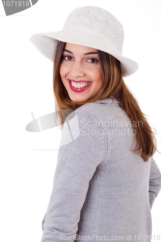 Image of Young smiling face model wearing a coat and hat