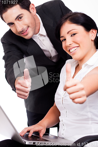 Image of Corporate people showing thumbs up
