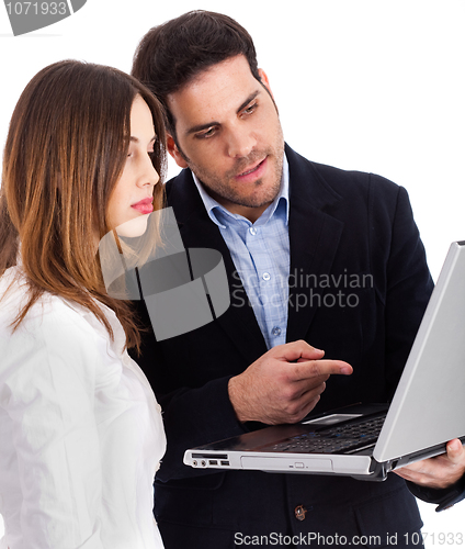 Image of Business people discussing with laptop