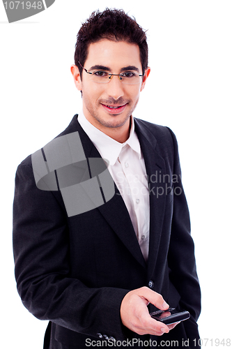 Image of Business man holding a mobile phone