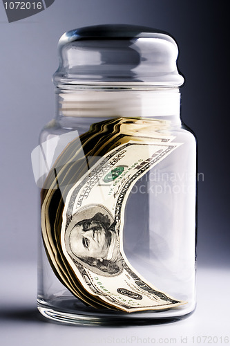 Image of money in glass jar