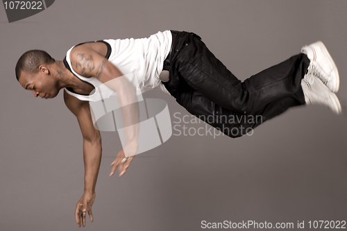 Image of Dancer jumping to the floor