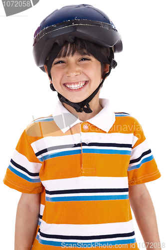 Image of Kid with head cap ready for bicycle ride