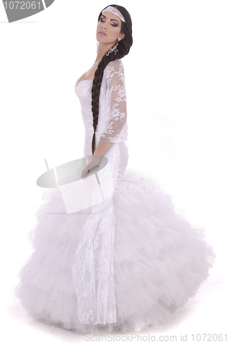 Image of Beautiful lady dressed in wedding costume