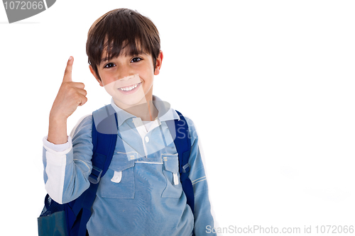 Image of Young school boy with finger up