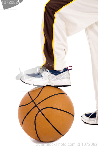 Image of A small kid leg over the ball