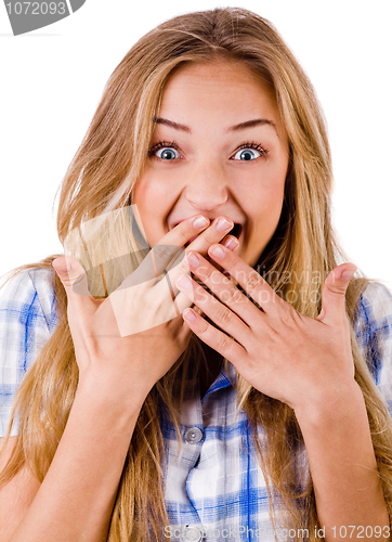 Image of Closeup of young women covering her mouth with both hands