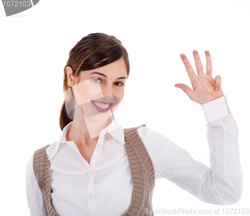 Image of Beautiful young model raising her hand up and showing four fingers