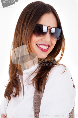 Image of Young brunette model smiling with sunglasses