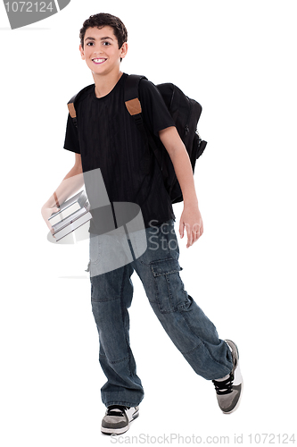 Image of Handsome teenager boy student with books in hand