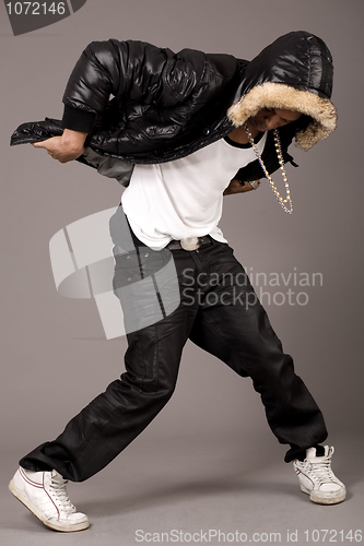 Image of Man performs hip pop steps