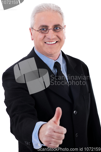 Image of Successful business man shows ok sign
