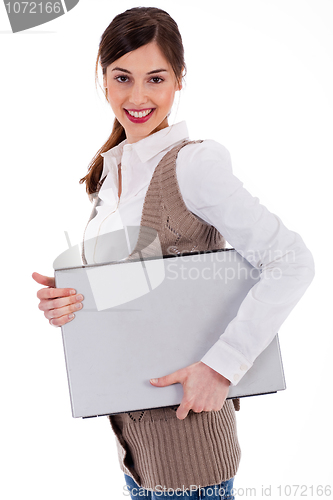 Image of young womencarrying a laptop
