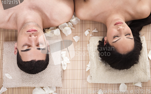Image of Beautiful relaxing couple in a spa closeup shot