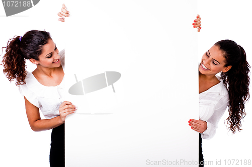 Image of Santa woman smiling with white board