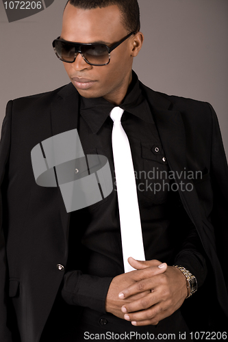 Image of Serious black business man with sunglasses