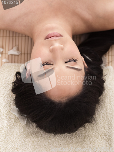 Image of Portrait of beautiful woman while spa treatment