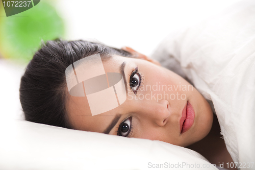 Image of sexy lady lying in her bed,closeup shot