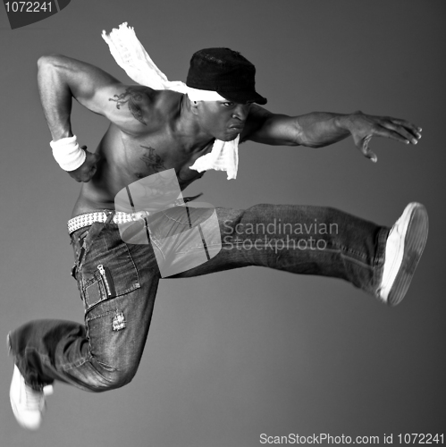 Image of African american guy freezing the move