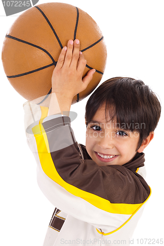 Image of Little kid while throwing the ball
